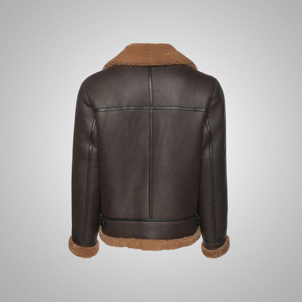 Rear view of men's B3 aviator flight jacket showing dark leather welted seam piping and tan shearling hem