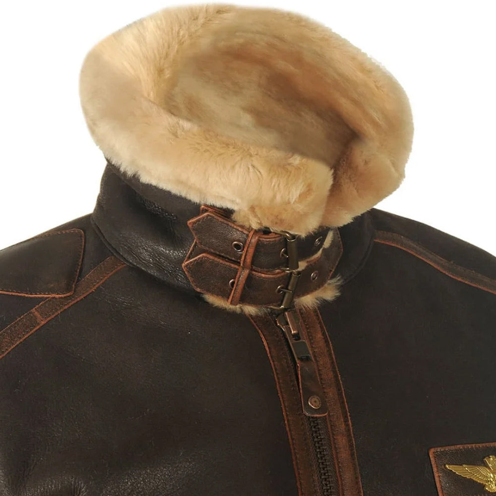 Close-up shot of double leather throat buckles on high shearling storm collar for wind protection