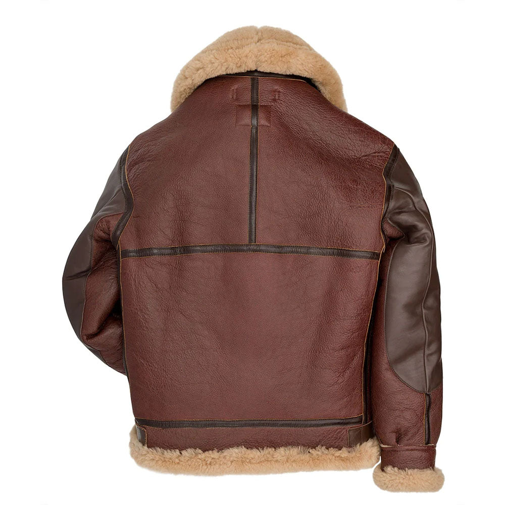 Back view of men's B-3 shearling jacket showing dark brown cowhide yoke seams, central vertical strip, and exposed wool hem