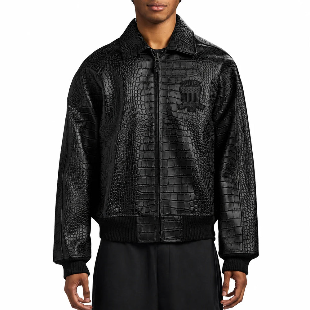 Man wearing the black Avirex Croc Icon leather bomber with embossed panels, zip front and rib-knit waistband