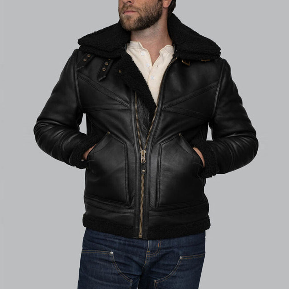Front view of model wearing men's black B3 aviator jacket half zipped over cream henley shirt