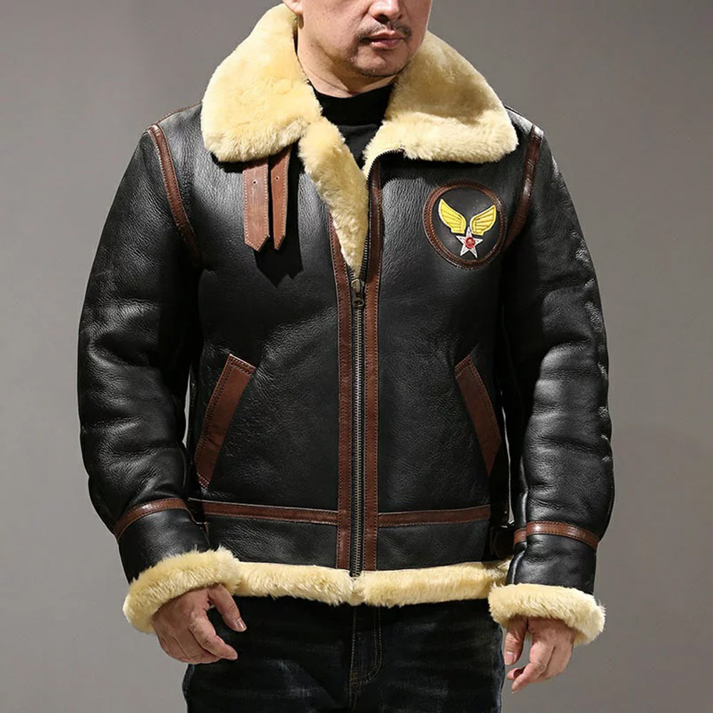 Front view of model wearing men's black B3 aviator shearling jacket with cream collar and embroidered USAAF emblem patch