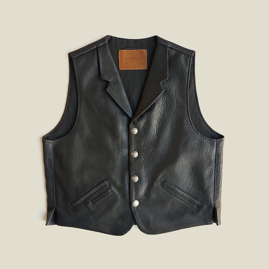 Front view of men’s black bison leather vest with notched Western lapels, Buffalo Nickel snaps and angled welt pockets