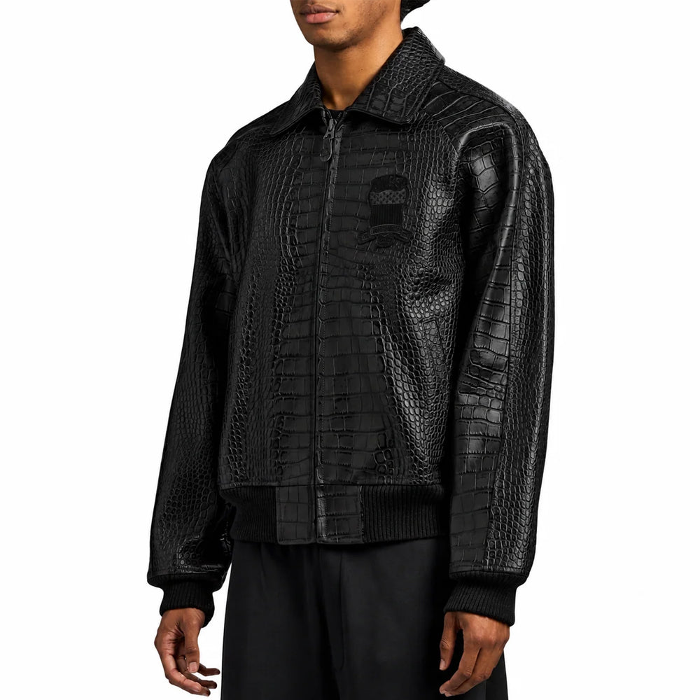 Angled view of men’s black goatskin bomber highlighting mixed crocodile-scale embossing across chest and sleeve