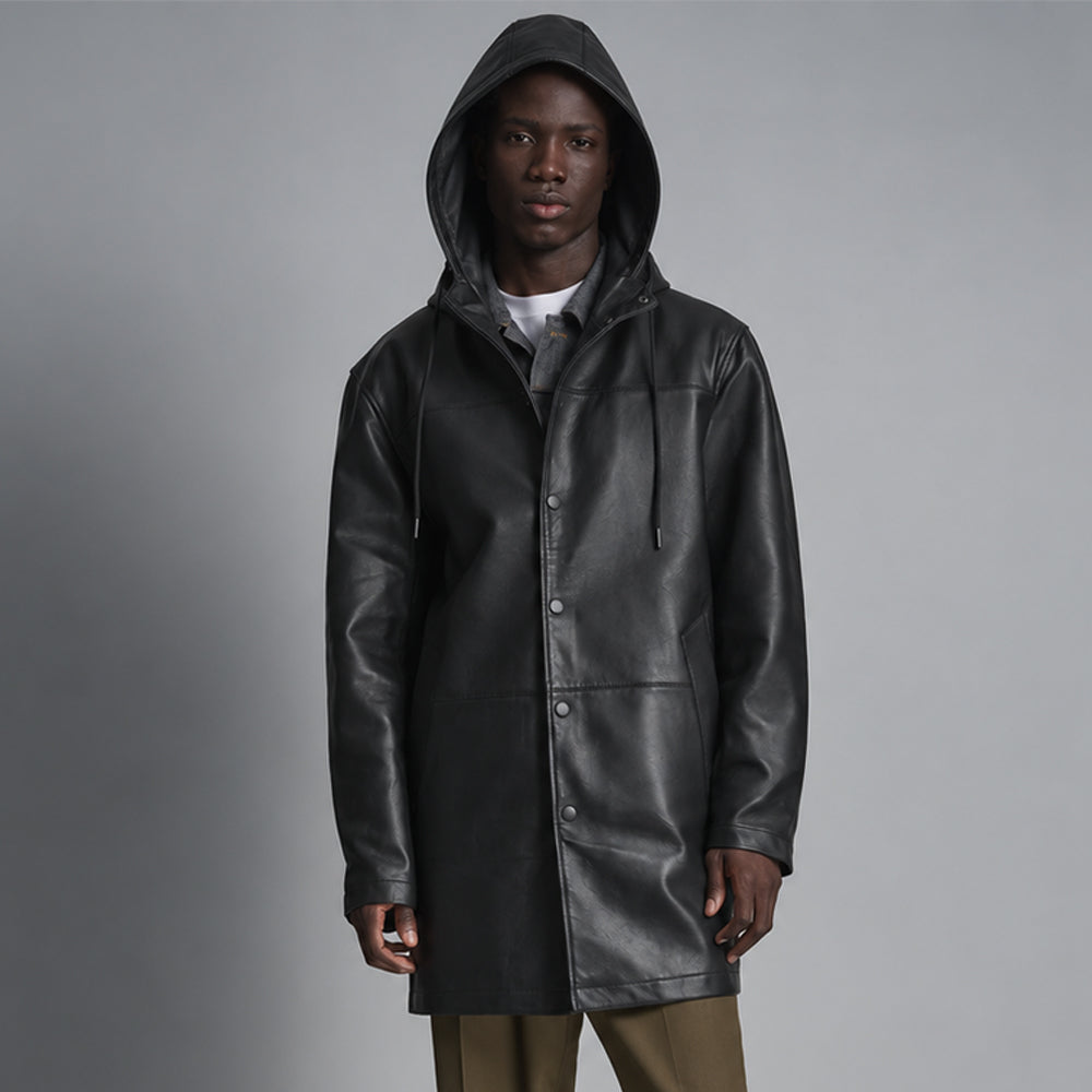 Front view of men’s black drawstring leather hoodie with hood raised, tonal snap closure and minimalist longline silhouette.