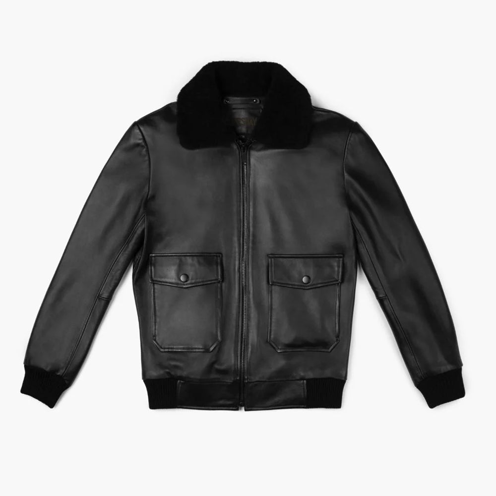 Front flat lay of men's black lambskin G-1 flight bomber jacket with detachable plush shearling collar.