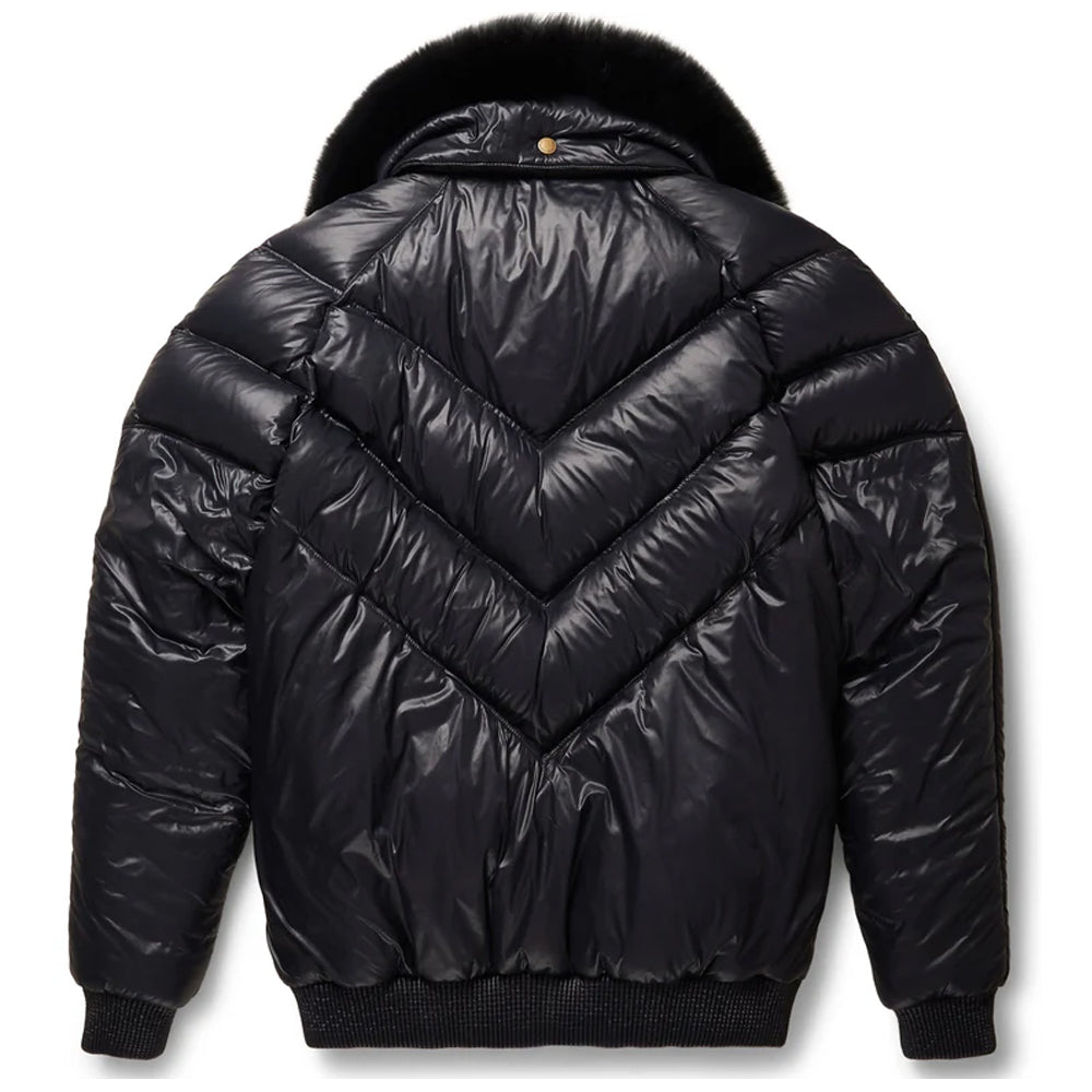 Rear profile view of the black nylon V-bomber down coat displaying the distinct quilted chevron bubble pattern.
