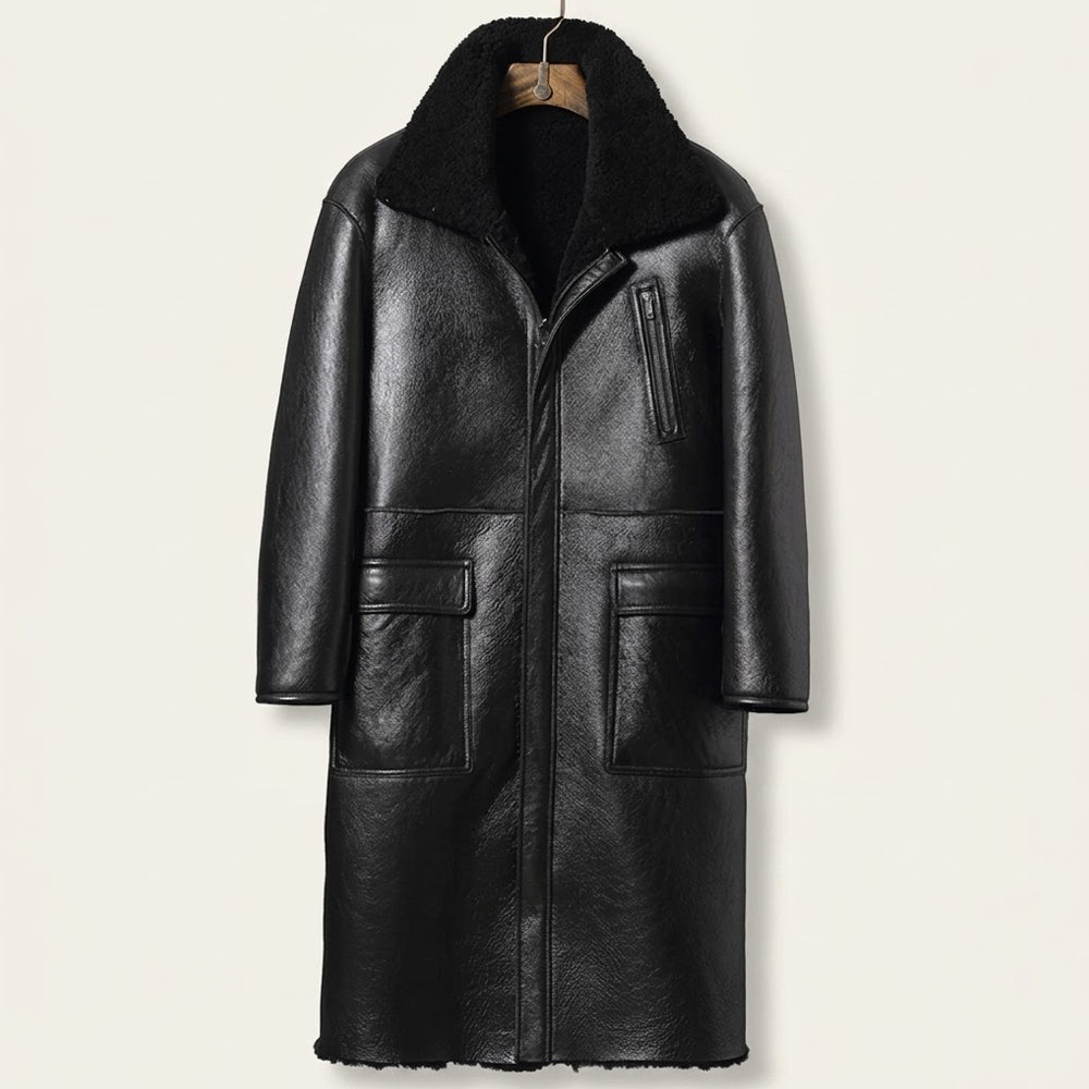 Black reversible shearling leather trench coat displayed on hanger