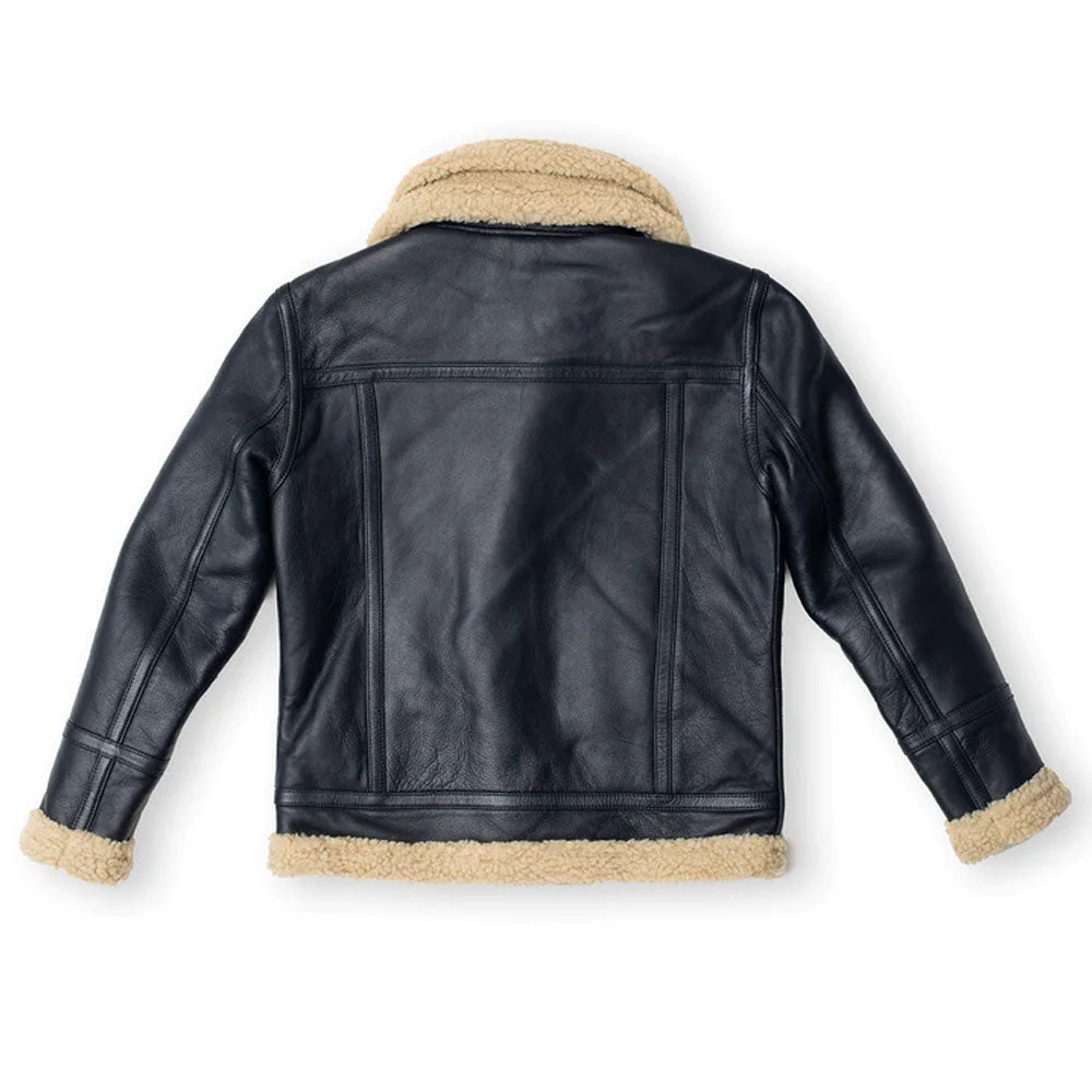 Back view of men's black shearling aviator jacket showing horizontal top yoke and double vertical seam piping