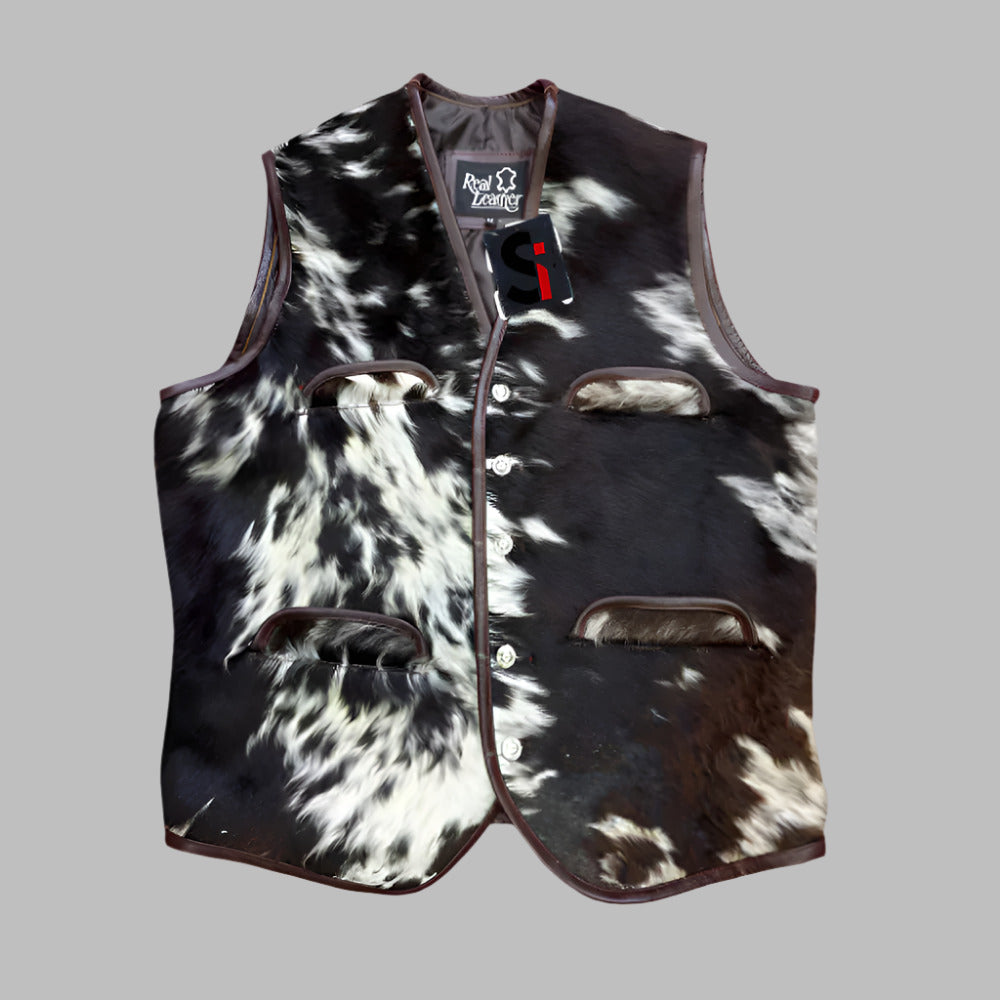 Front view of the men's black and white cowhide leather vest showing the natural hair-on pattern.