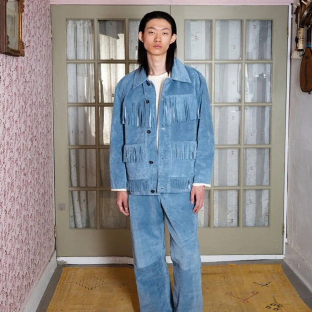 Men’s blue Western suede fringe jacket styled with matching relaxed trousers