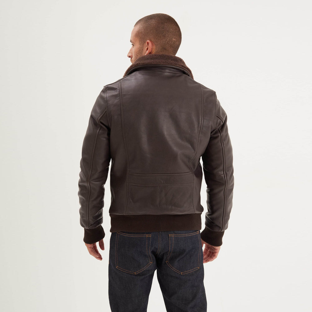 Rear view of men's brown flight bomber with sculpted vertical seams, lower back panel and dark rib-knit waistband.