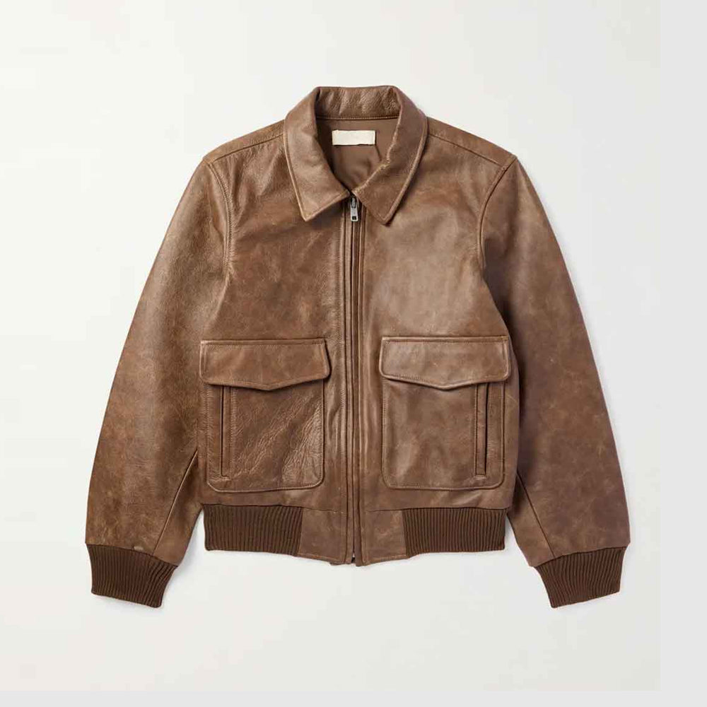 Front flat lay of men’s brown Los Angeles leather bomber with point collar, YKK zipper and dual-entry flap pockets