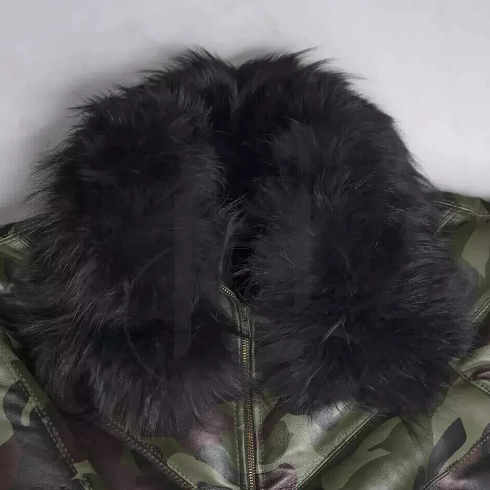A close-up view of the premium plush jet black fox fur collar on the camouflage sheepskin leather puffer coat.