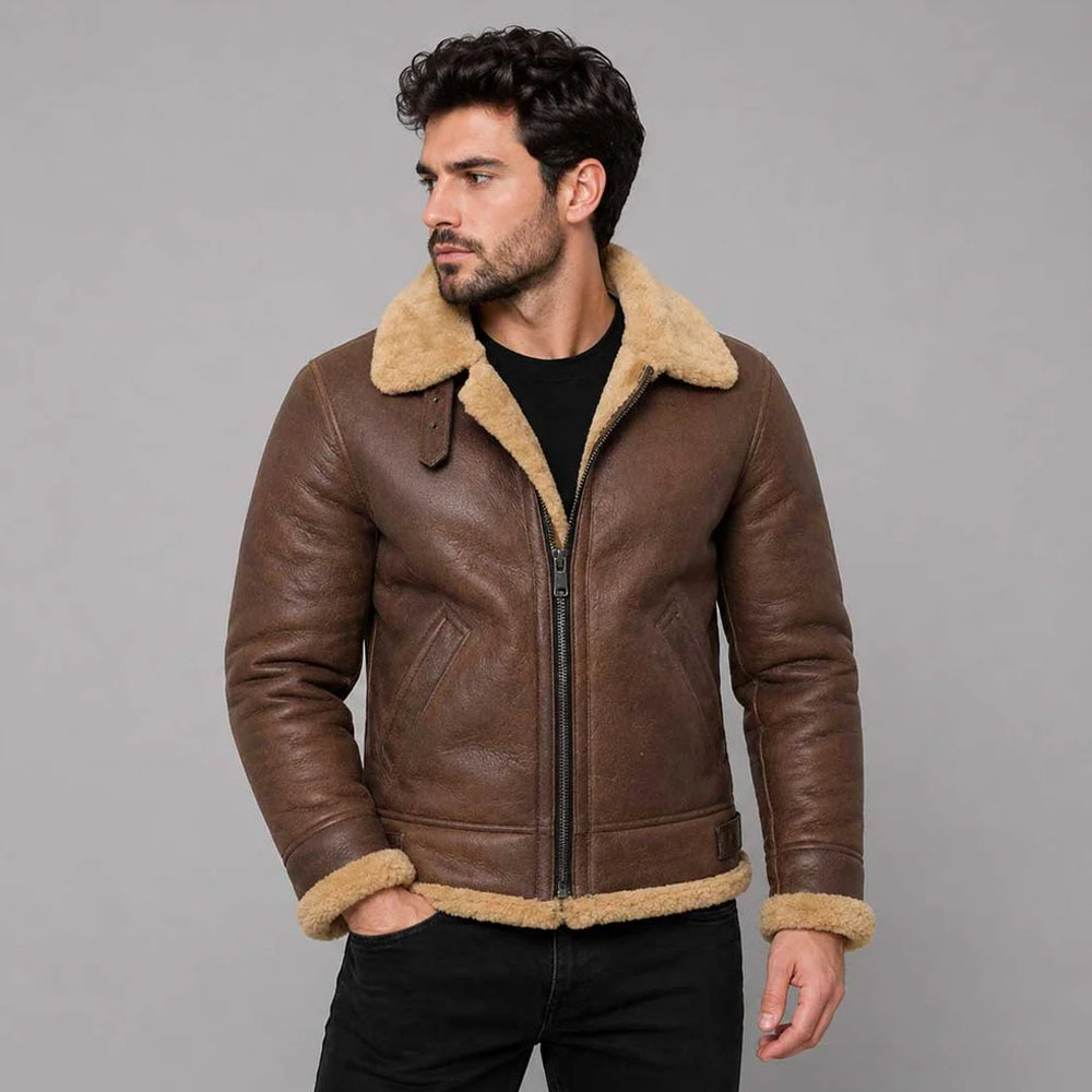 Front view of model wearing men's chestnut brown B3 antique sheepskin shearling jacket with honey gold fur collar