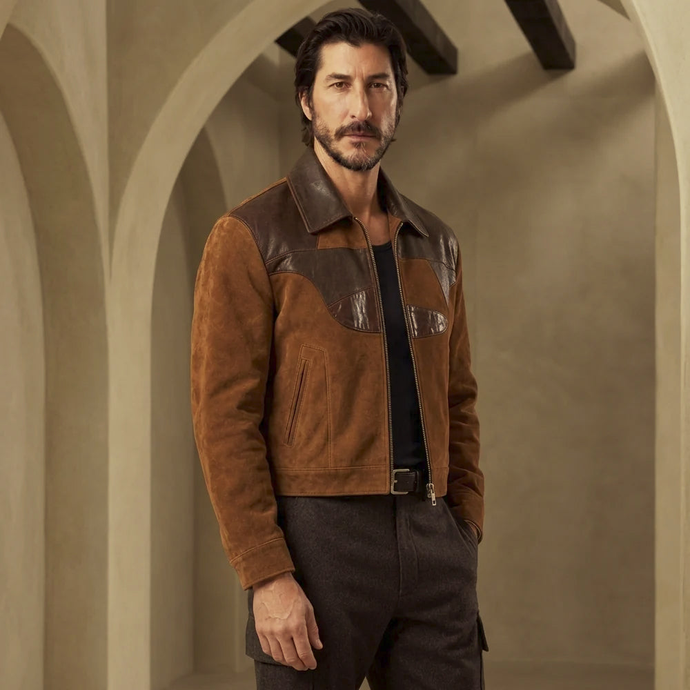 Three-quarter view of men’s cognac lambskin suede jacket showing smooth dark brown shoulder panels and waist-length regular fit.