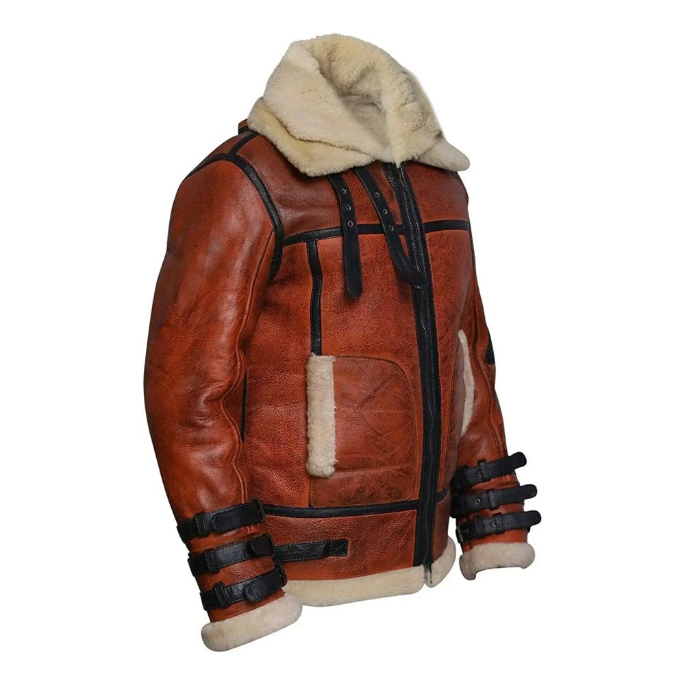 Side profile of men's cognac tactical shearling bomber jacket showing black leather arm cargo pocket.