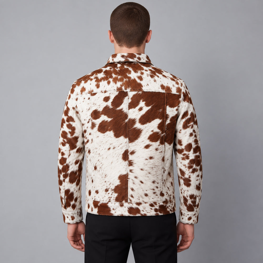 Rear view of men’s hair-on cowhide jacket showing shoulder yoke, vertical panel seams and straight hem