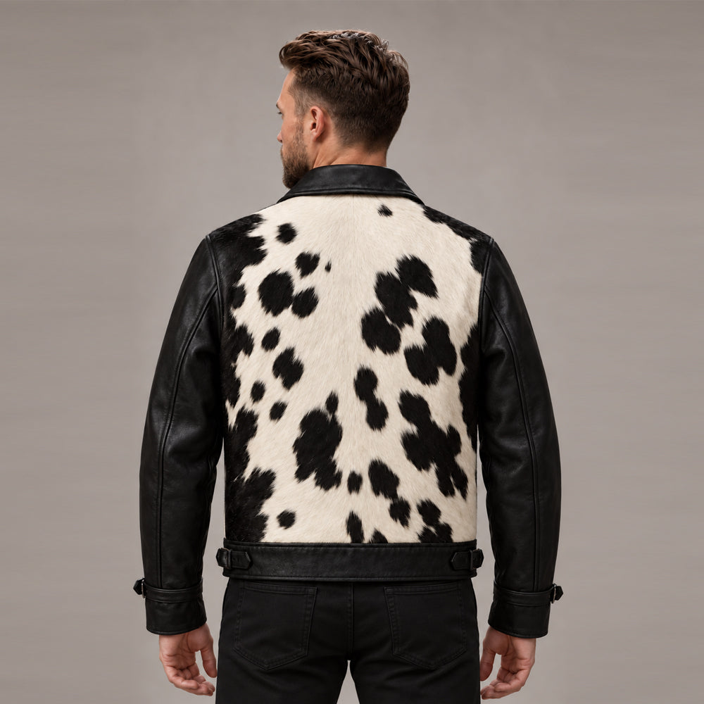 Back view of men’s cowhide ranch jacket showing natural spotted hide and black leather sleeves