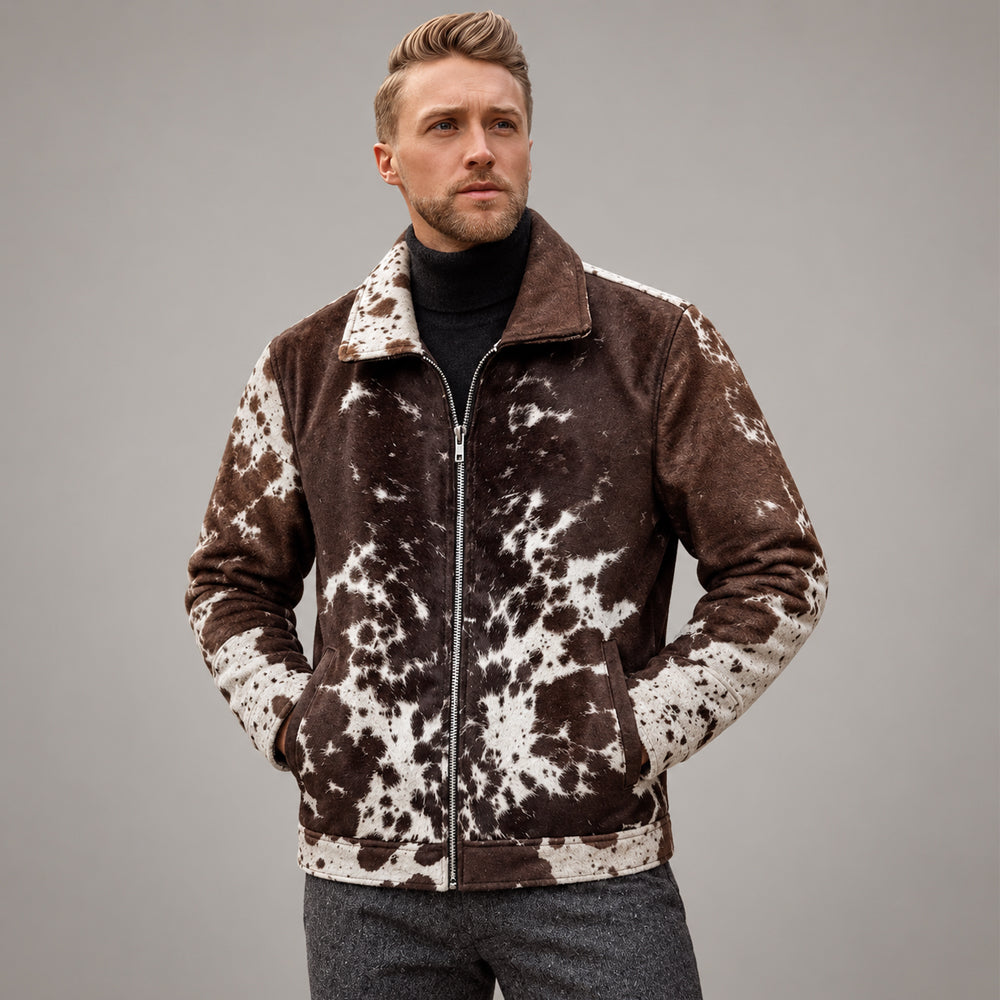 Model wearing a men’s brown cowhide rodeo jacket with nickel zipper and angled hand pockets