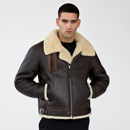 Front view of men's dark brown B-3 shearling aviator jacket with cream collar and waist buckles