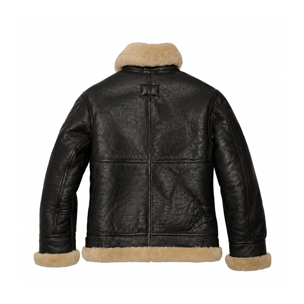 Back view of men’s dark brown shearling flight jacket showing cream fleece hem, center welt, horizontal panel seam and shaped sleeves.