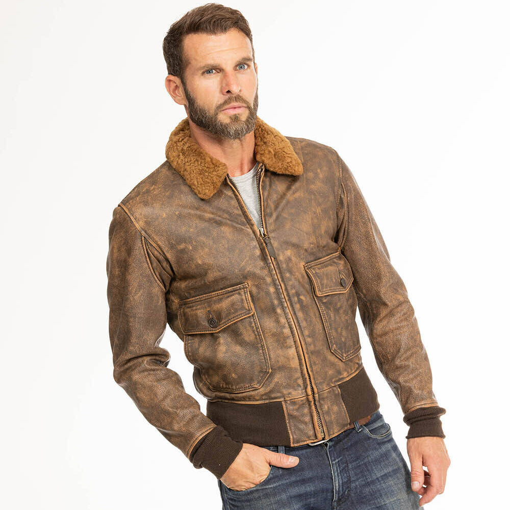 Angled view of model wearing men's distressed brown G-1 flight jacket with shearling fur collar.