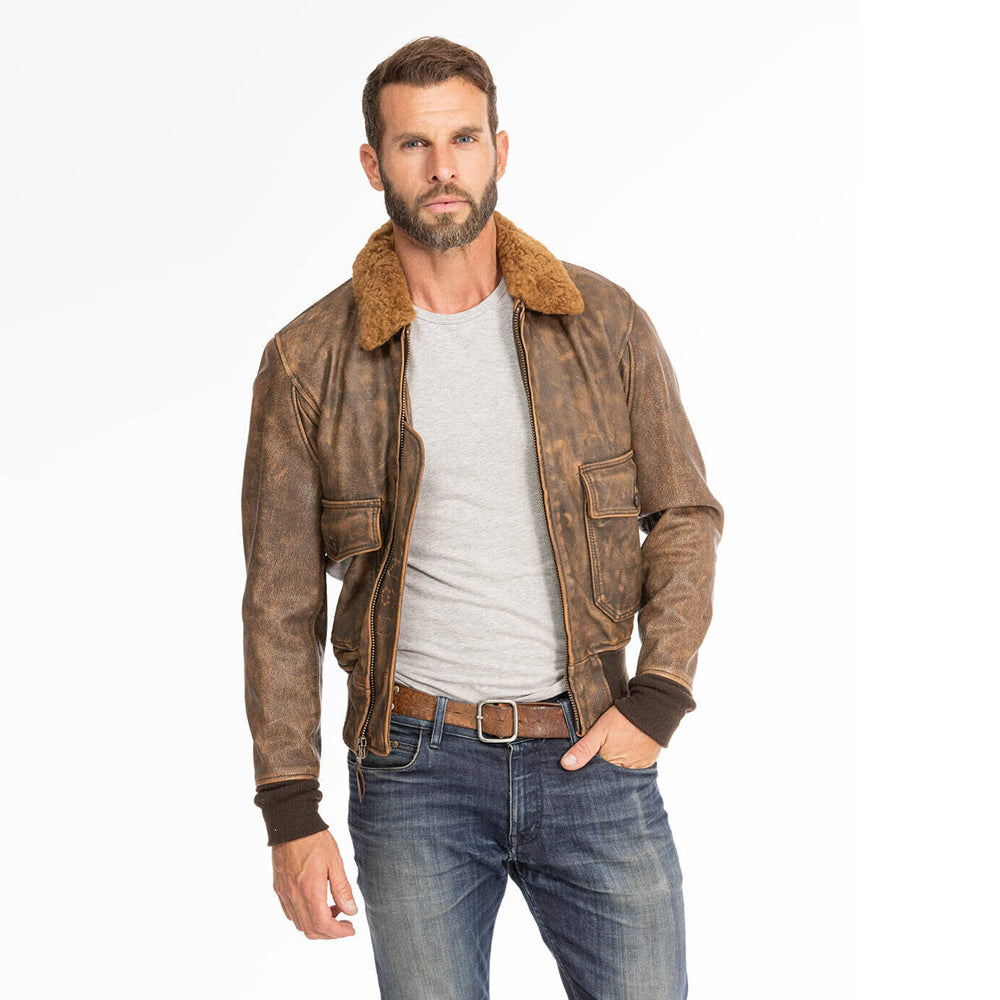 On-model front view of men's distressed brown G-1 flight jacket worn open over grey t-shirt.