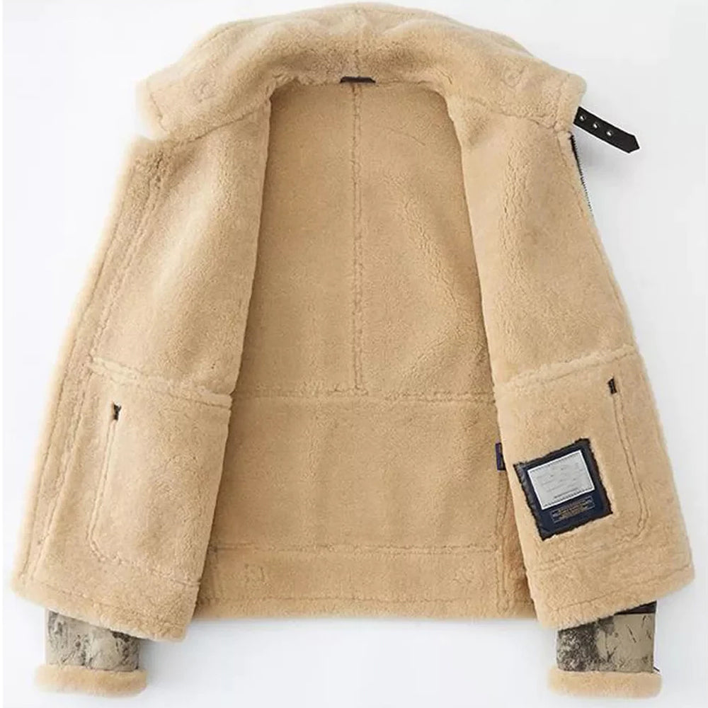 Inside open view of men's distressed crackle wash B-3 shearling jacket showing soft beige fur lining and inner specs label