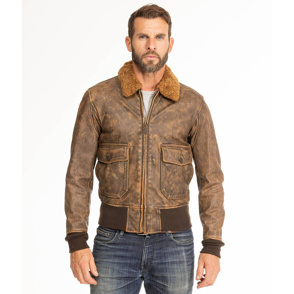 Standing front view of model wearing men's distressed G-1 aviator flight jacket with fur collar.