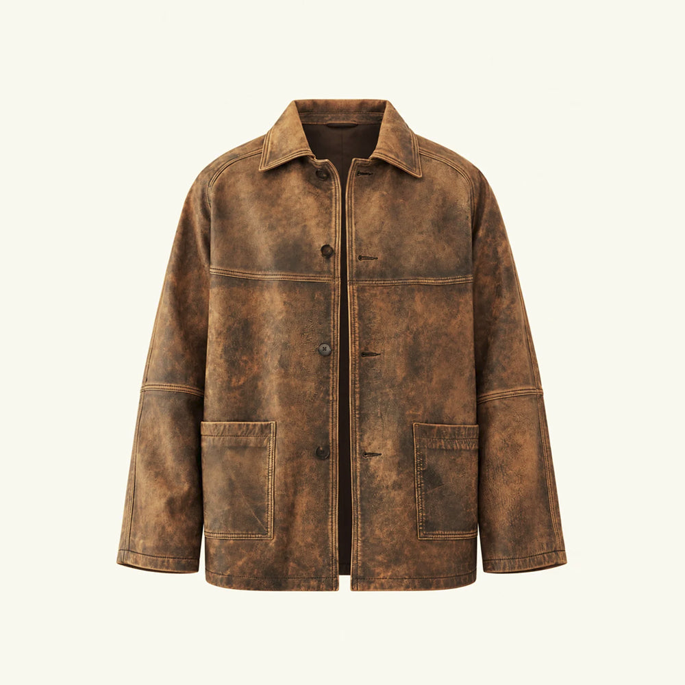 Flat front view of men’s distressed leather chore jacket with point collar, brown buttons and two large patch pockets