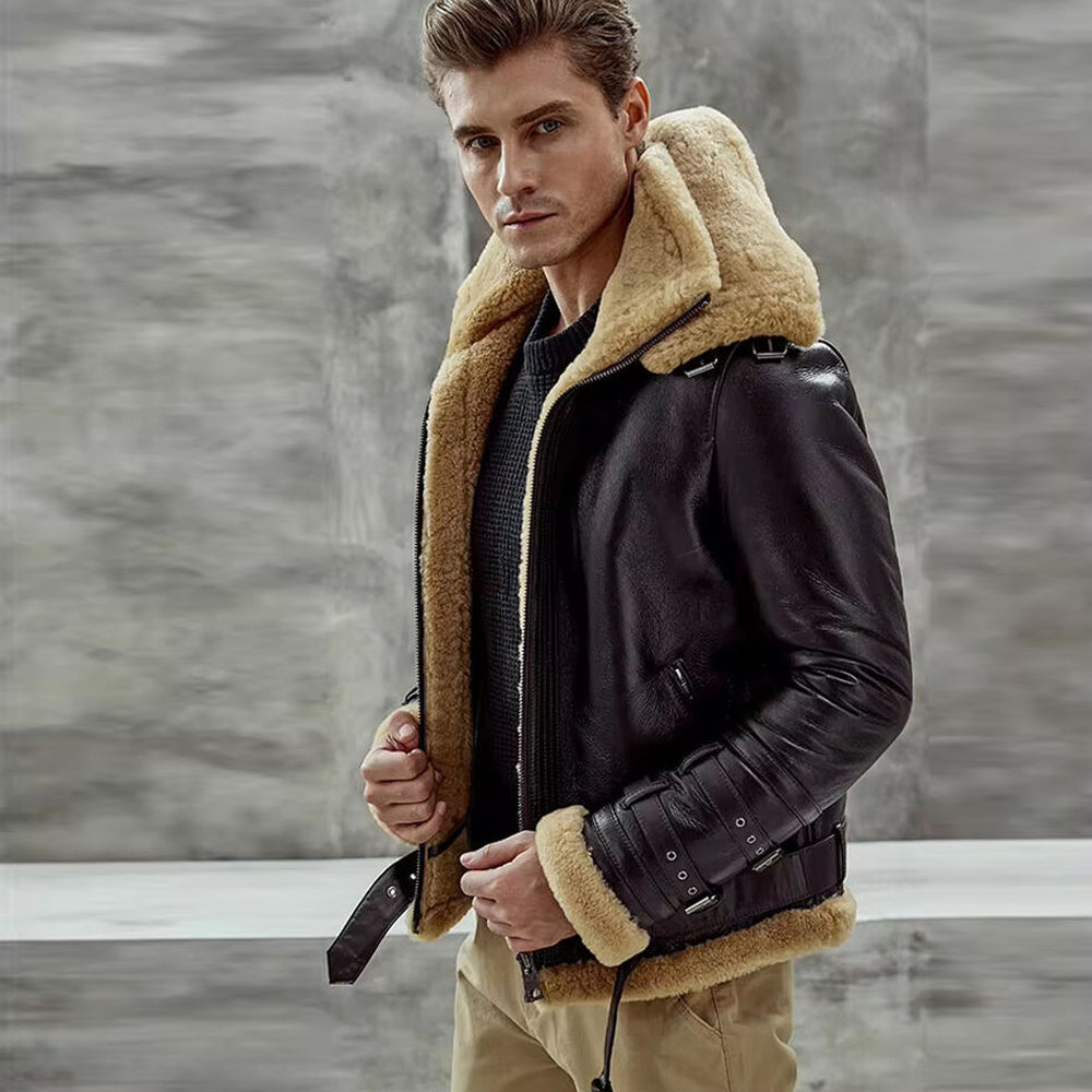 Model wearing men's espresso B3 flight jacket with dual forearm cuff buckles and raised fur collar