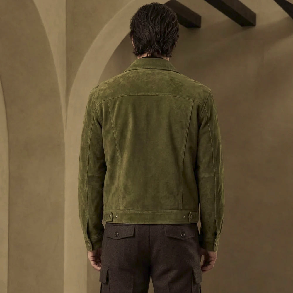 Back view of men’s forest green suede jacket with horizontal trucker yoke, central panel, shaping seams and adjustable hem tabs.