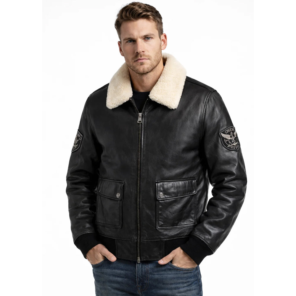 Front view of model wearing men's G-1 black lambskin flight bomber jacket with off-white shearling collar
