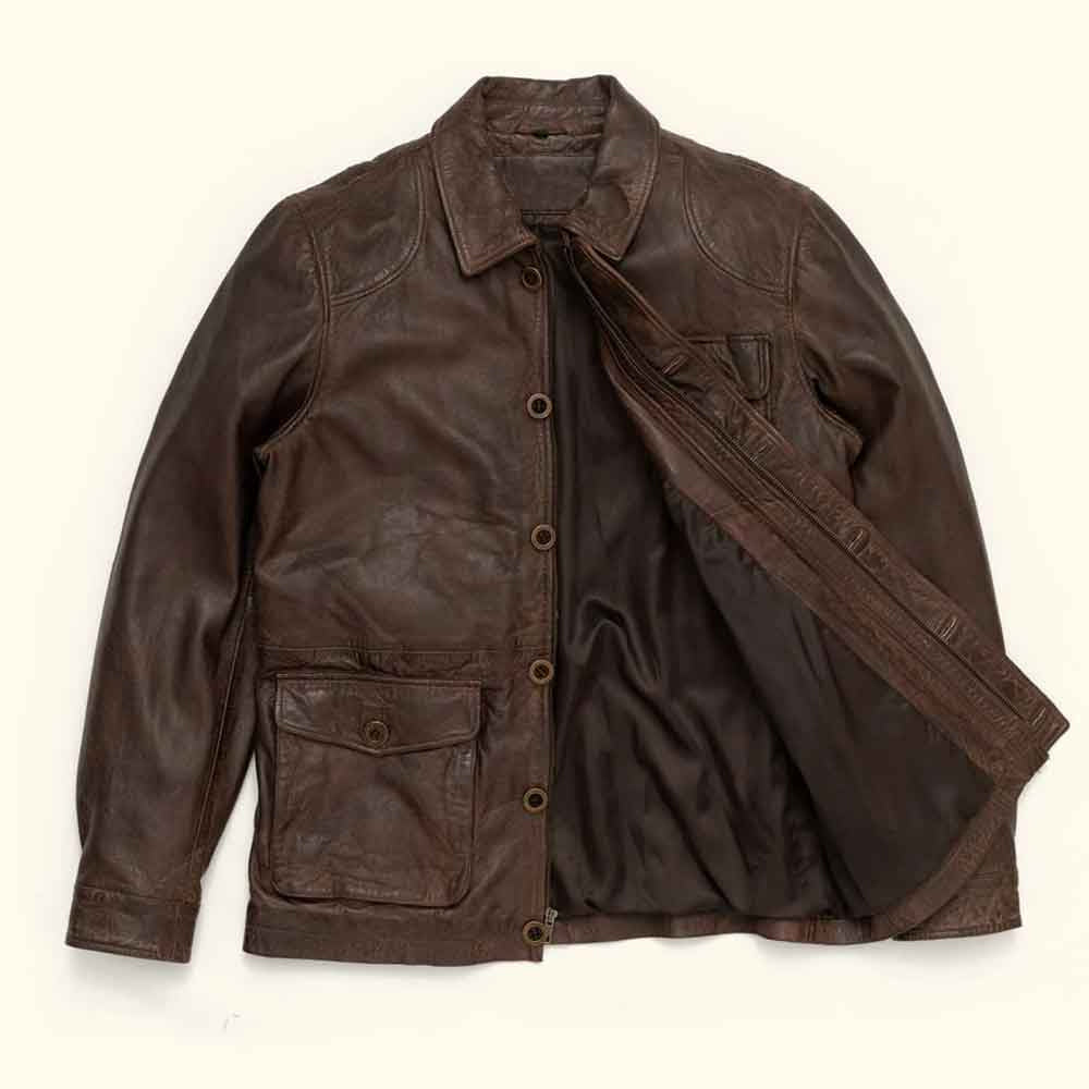 Open front view of men’s leather chore jacket displaying dual closure, full lining and lower flap patch pocket