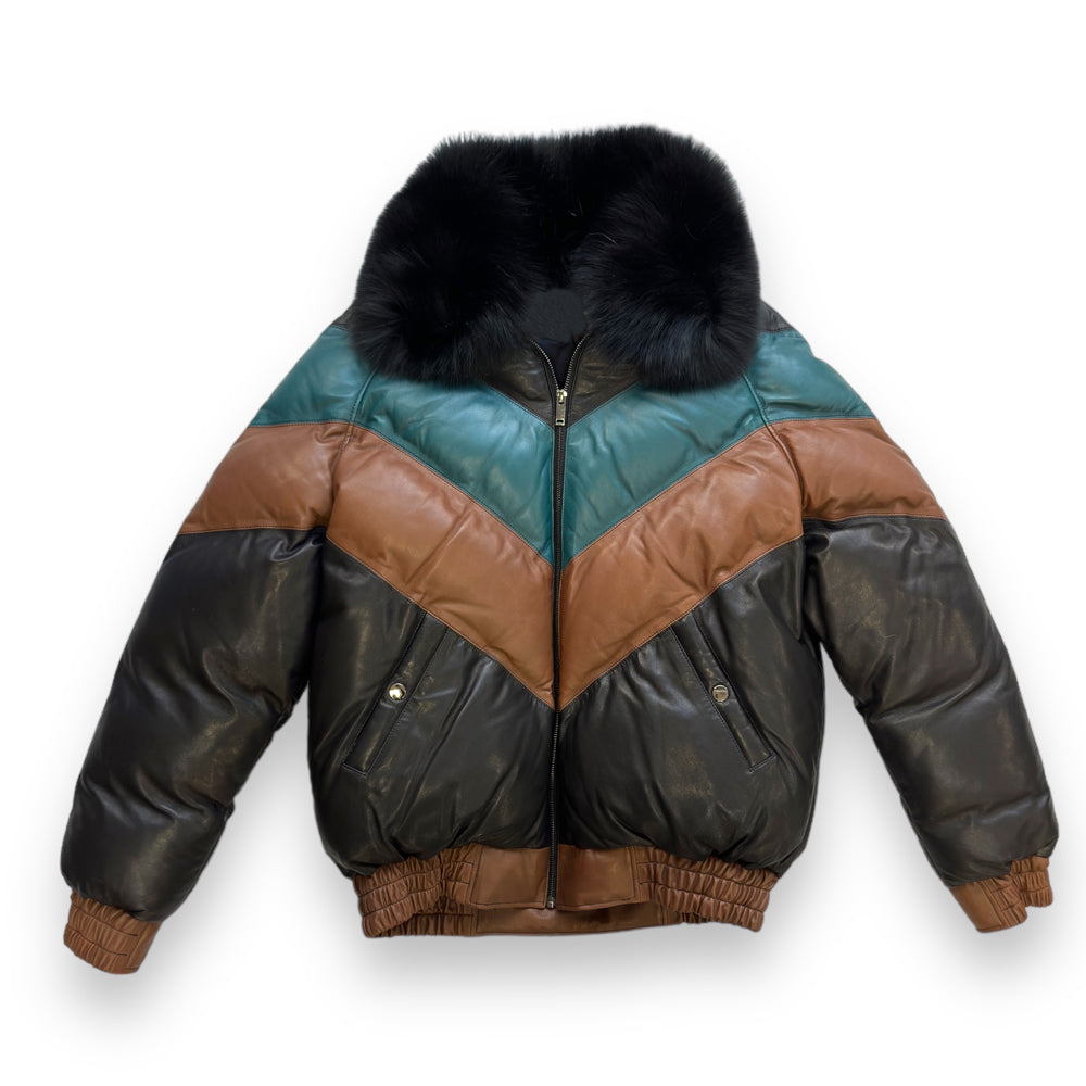 Front view of the men's multi-color sheepskin leather V-bomber jacket in black, teal, and tan featuring a black fox fur collar.