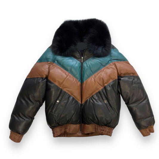 Front view of the men's multi-color sheepskin leather V-bomber jacket in black, teal, and tan featuring a black fox fur collar.