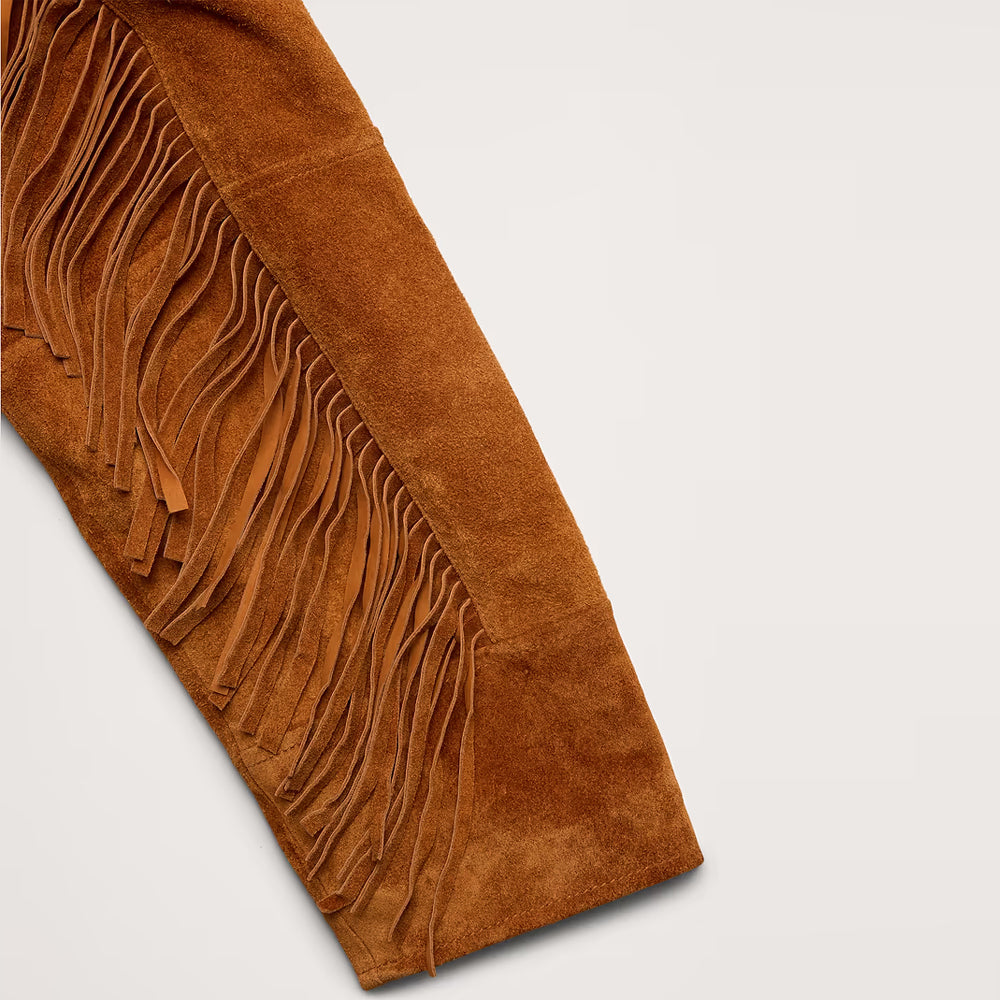 Detail of men's suede rancher jacket with long fringe secured along the outside sleeve and tonal stitched cuff.
