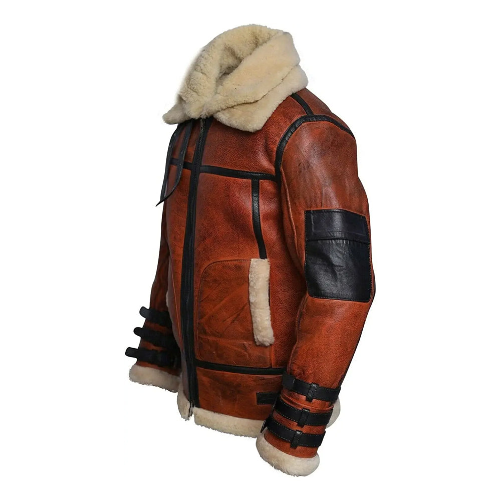Close-up side view of men's RE4 Leon Kennedy shearling jacket displaying black arm patch pocket and triple forearm straps.