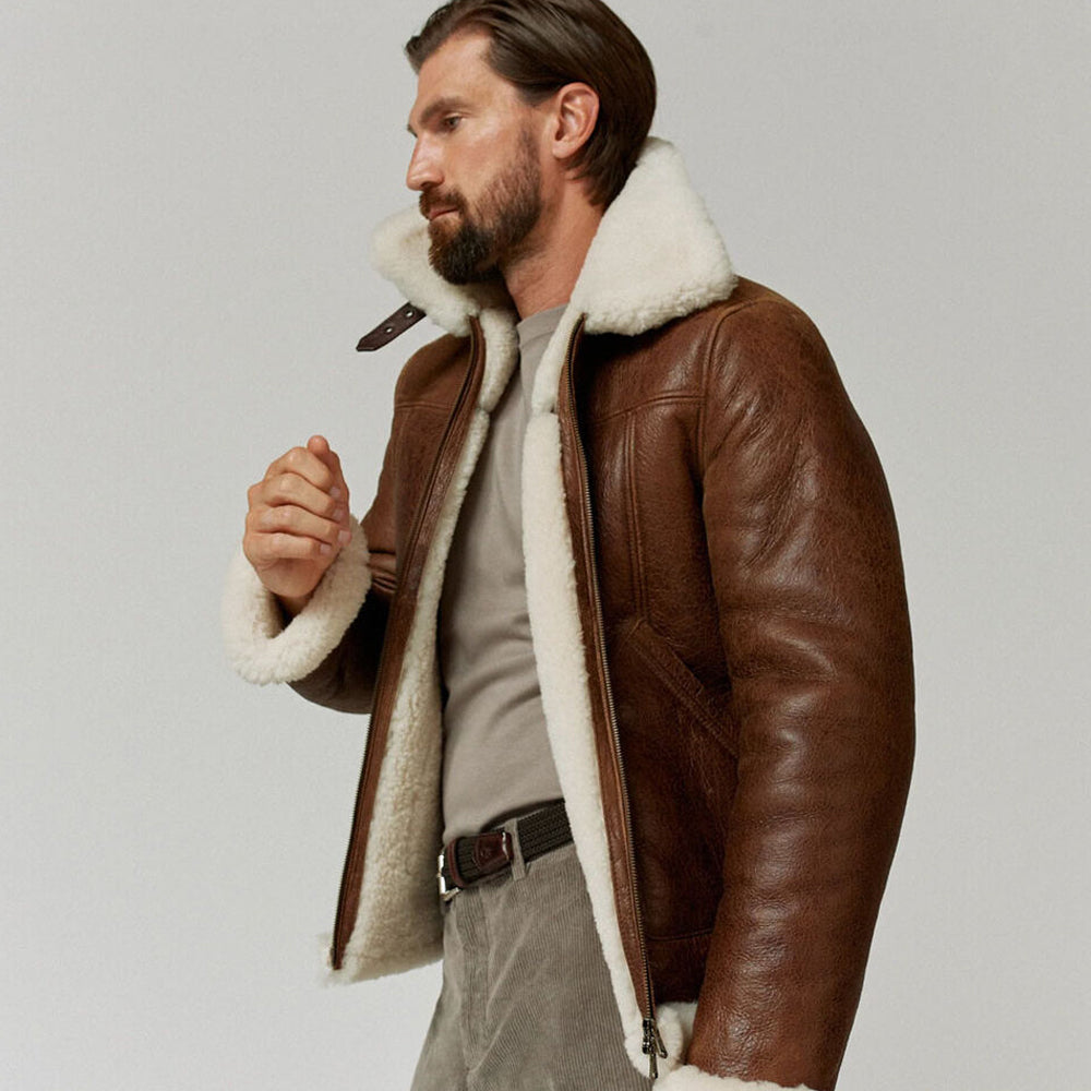 Angled view of model wearing open shearling aviator coat revealing full interior white fleece lining