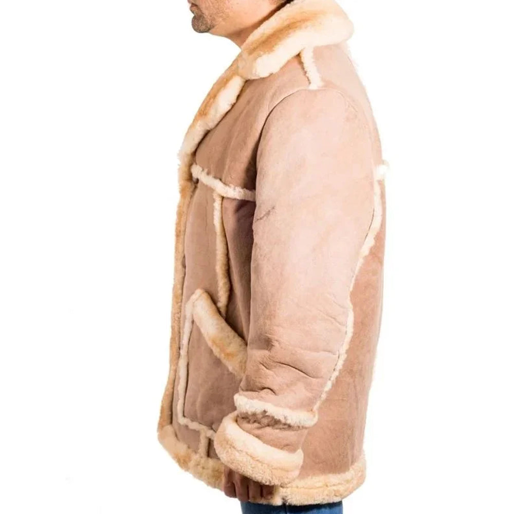 Side profile of men's genuine sheepskin leather jacket highlighting shearling-trimmed collar and patch pocket silhouette