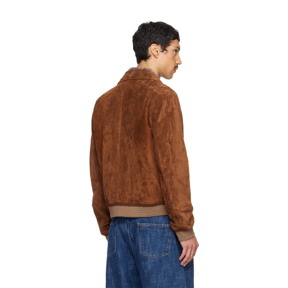 Rear three-quarter view of men's suede jacket displaying the centered back seam, clean shoulders and waist-length profile.