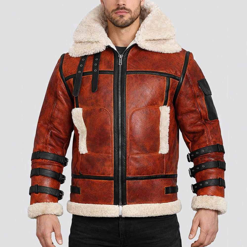 Model wearing men's tactical cognac shearling aviator jacket zipped up with wide cream wool collar.