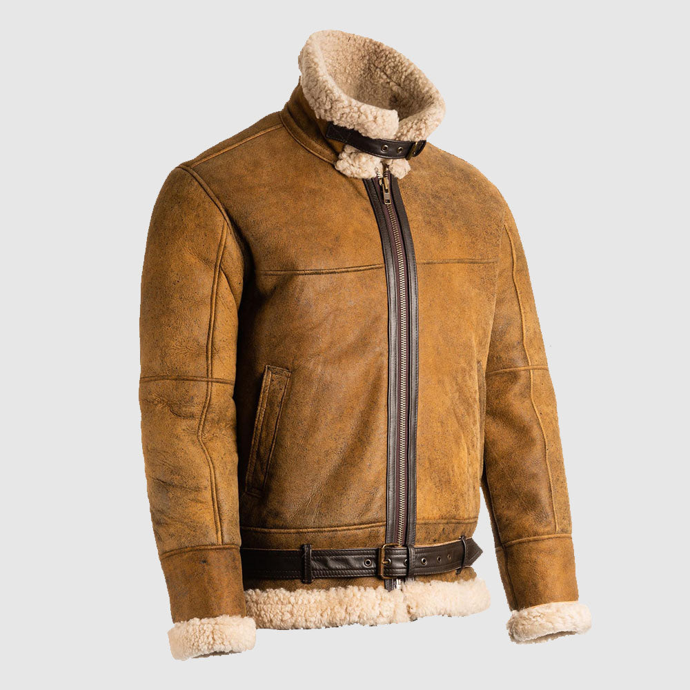 Angled side view of men's tan shearling aviator jacket showing buckled throat latch collar and dark brown placket piping