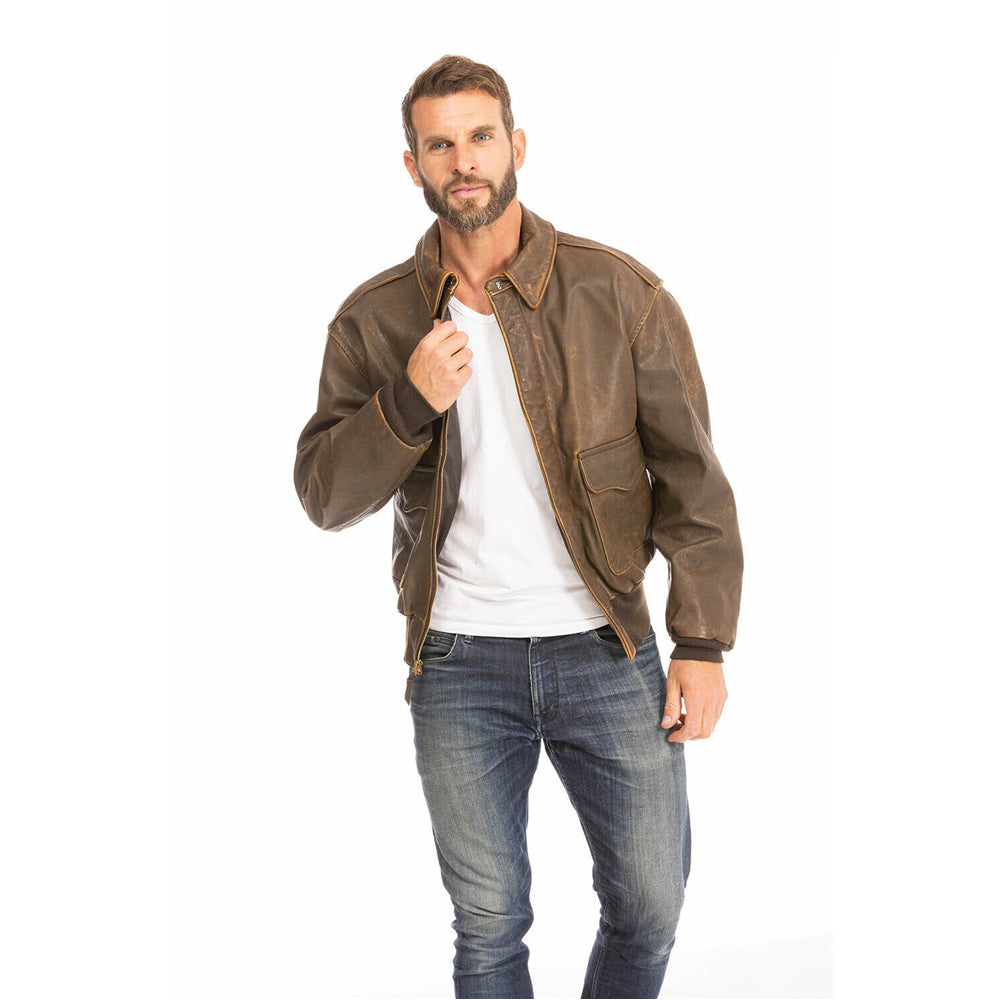 On-model studio shot holding front zipper open on vintage A-2 brown leather flight jacket.