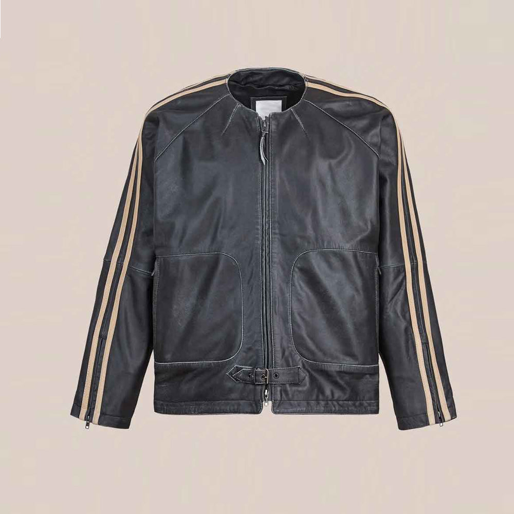 Front view of men’s vintage black cowhide track jacket with cream double sleeve stripes, curved zip pockets and buckled waist tab