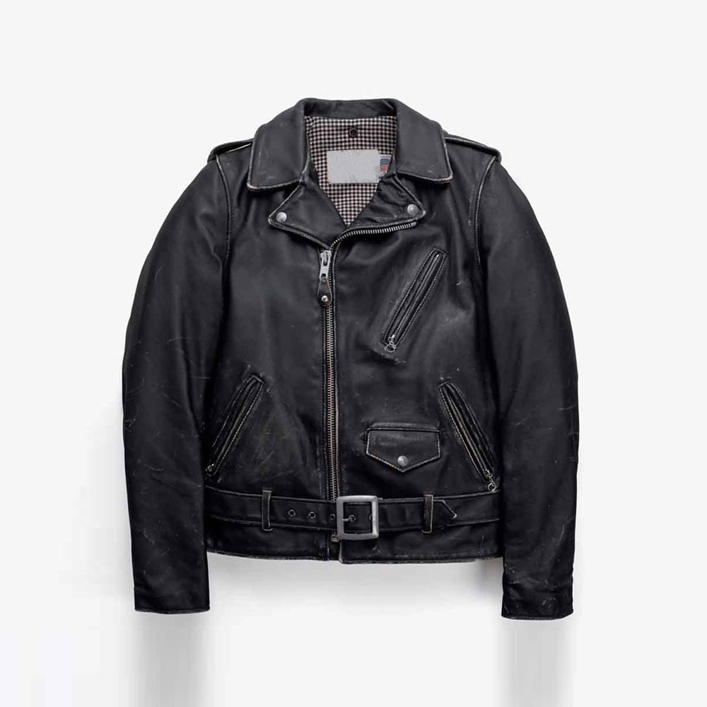 Front view of men’s vintage cowhide motorcycle jacket with distressed black finish, asymmetrical zipper, snap lapels and buckled belt