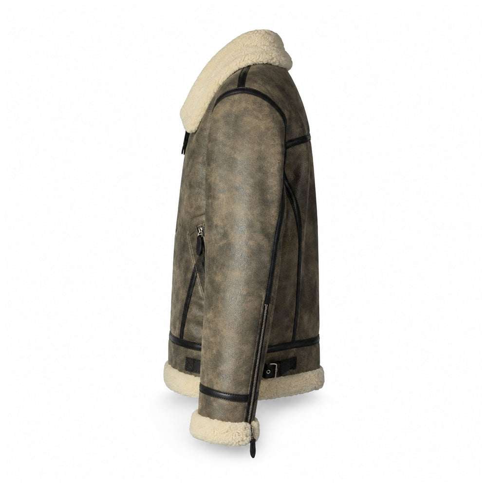 Side view of men’s washed-olive sheepskin flight jacket showing zip pocket, wrist zipper and adjustable waist buckle