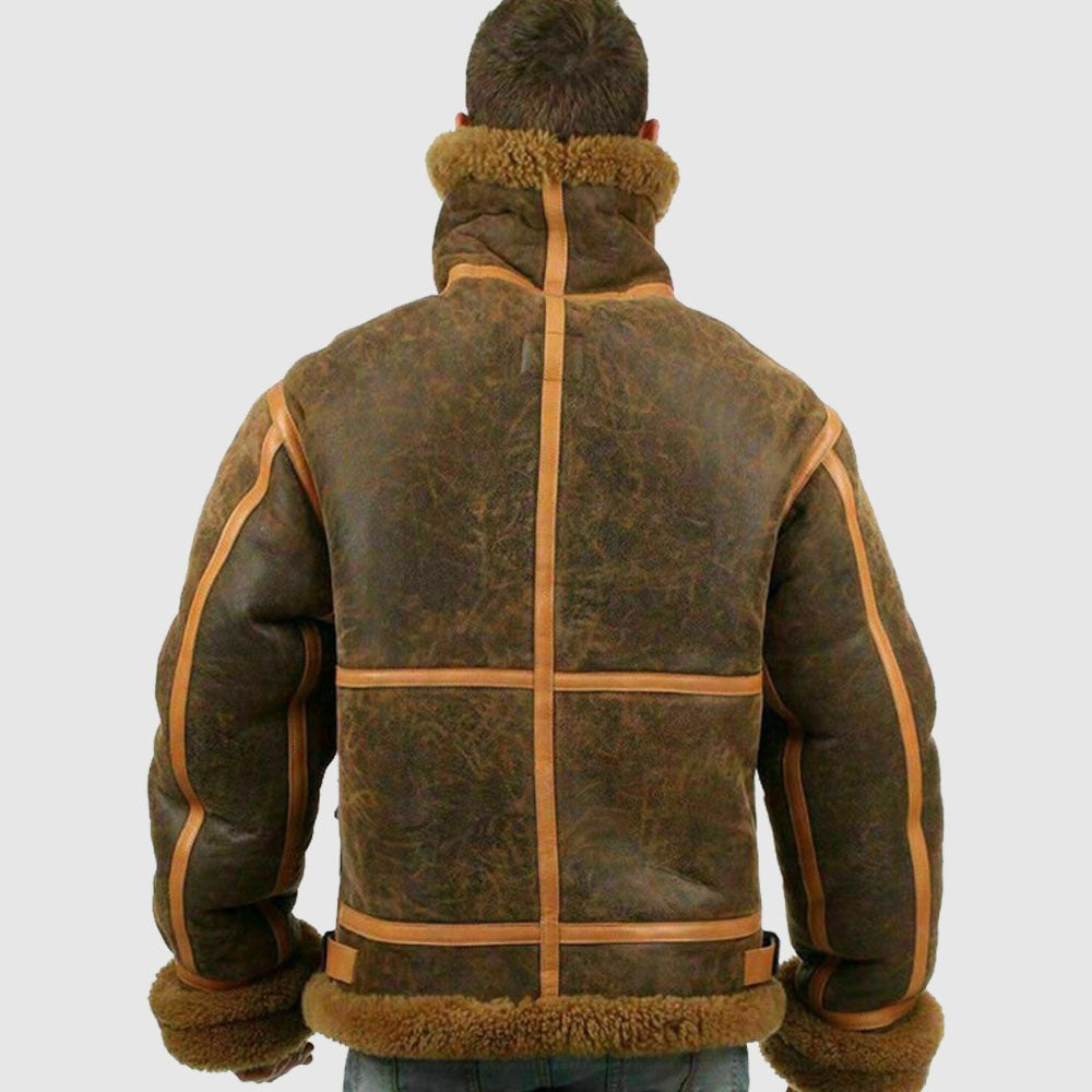 Back profile view of men's weathered brown shearling aviator coat displaying contrast tan seam grid taping and turned fleece collar.