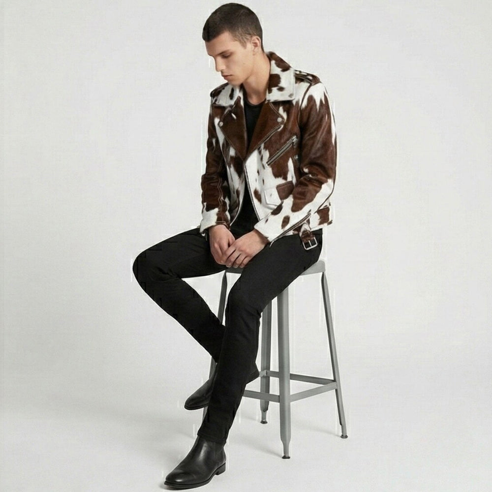 Seated model wearing a men’s Western cowhide biker jacket with asymmetrical front closure